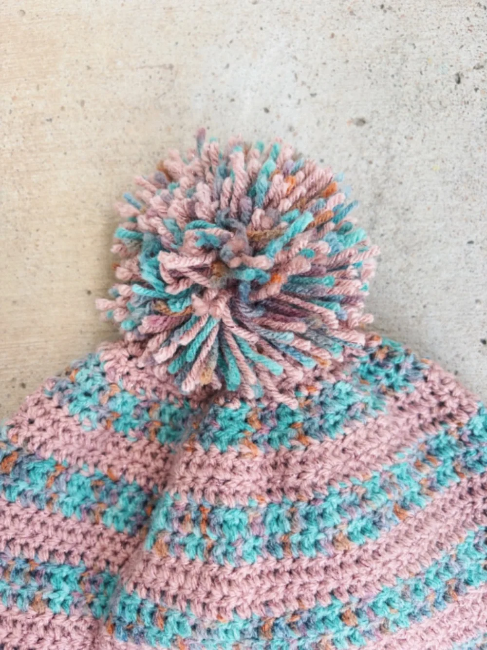 Handmade Crocheted Winter Hat in Pink, Teal, and Purple